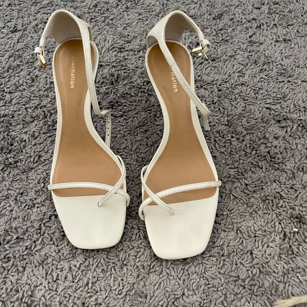 Reformation Gigi heels. Super cute. A bit of wear at the heel. Worn 3 times!